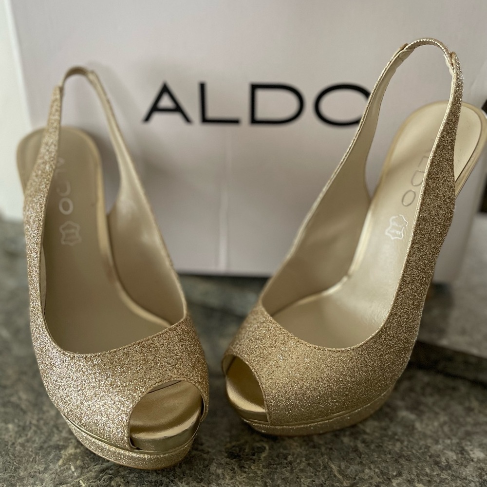 Also gold glitter open toe heels